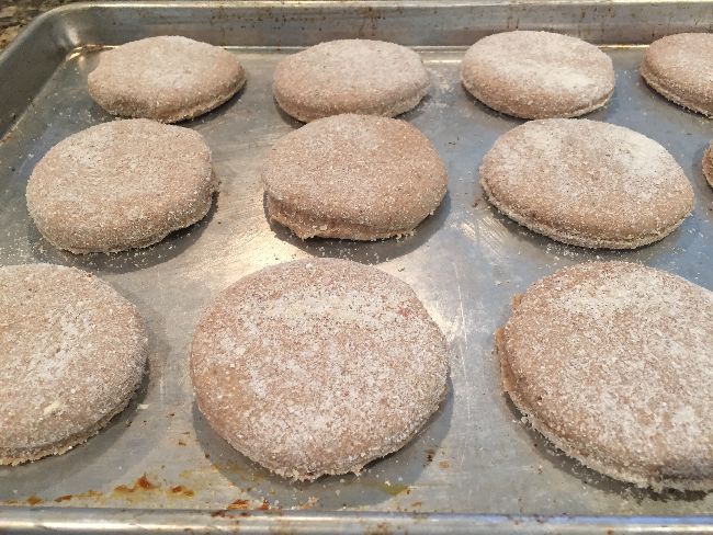 Cut whole wheat English muffin rounds on cookie sheet to rise