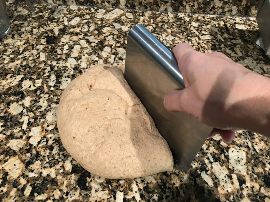 Cutting whole wheat bread dough