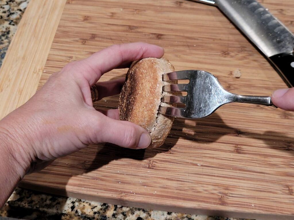 English Muffins separated with a fork